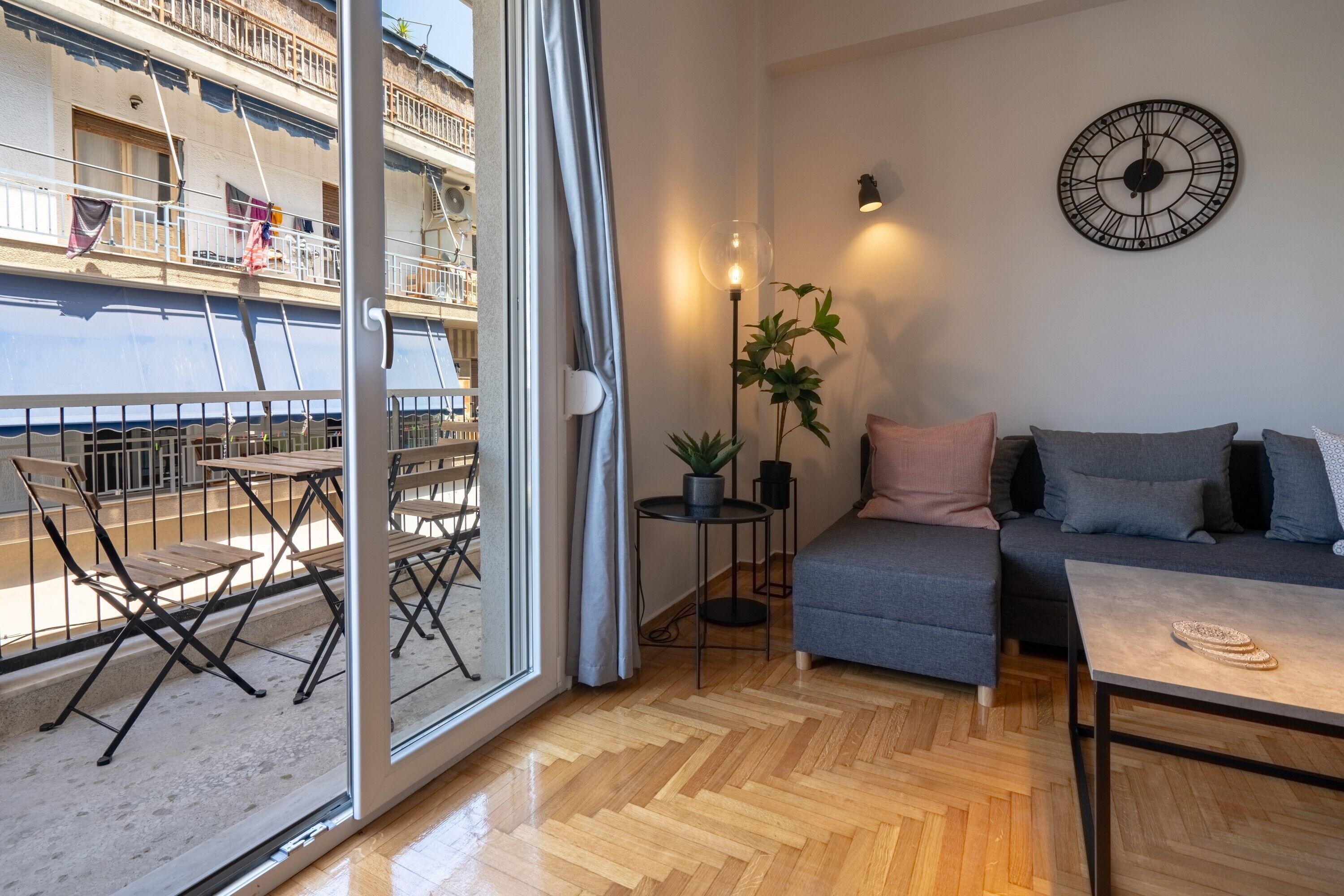 Bright living area with balcony view at Beba's House, central Athens